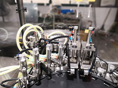 Máquina de llenado y sellado aséptico de frascos viales serie KHG-60